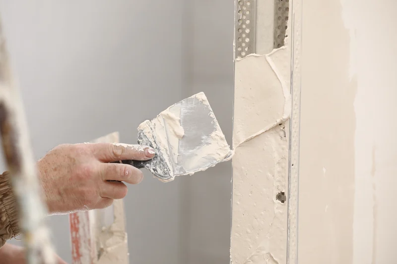 Compound worked by hand into the edge of a plaster wall